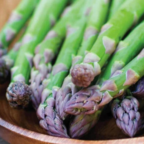 Asparagus in a wooden bowl.