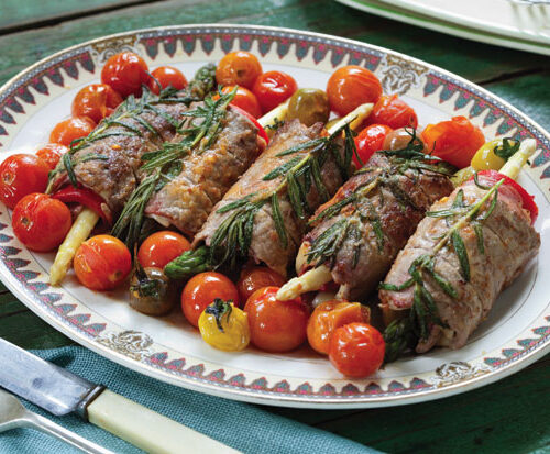 Asparagus royale Asparagus and beef involtini with heirloom cherry tomatoes.