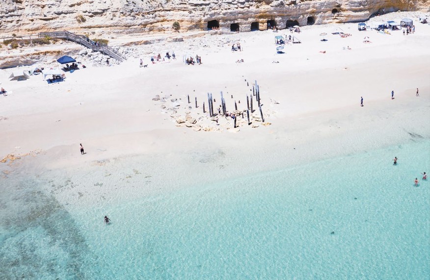 Aerial view of Port Willunga Beach and its historic jetty pylons