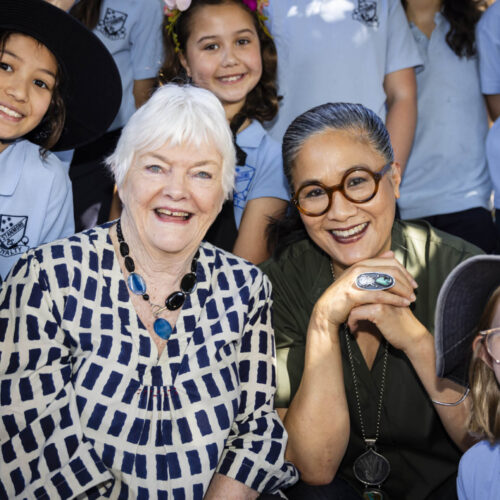 Stephanie Alexander and Kylie Kwong surrounded by Stanmore Public School students.
